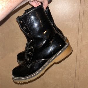 Black shiny combat boots